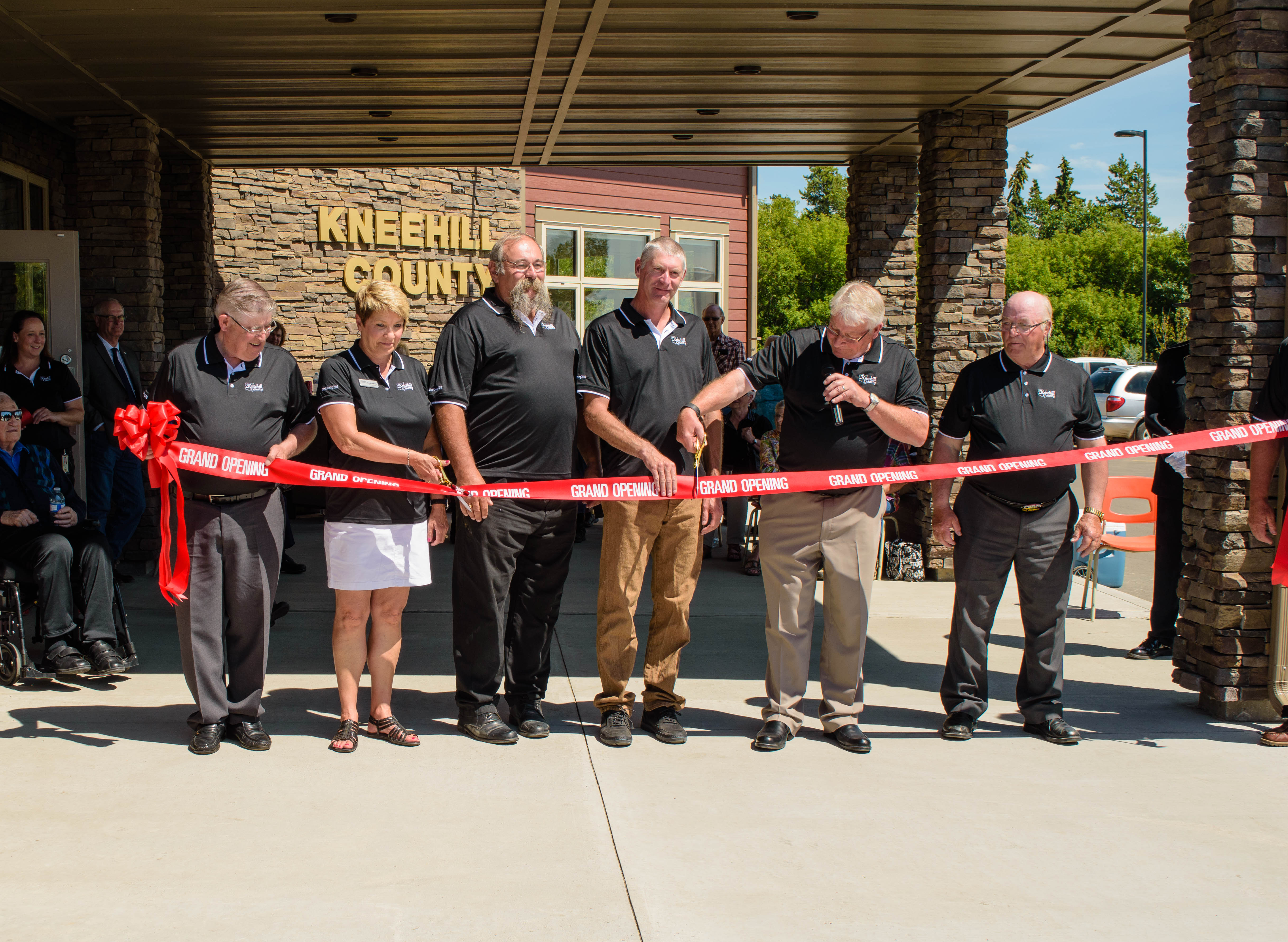 Kneehill County Councillors cutting the ribbon to their beautiful new building!